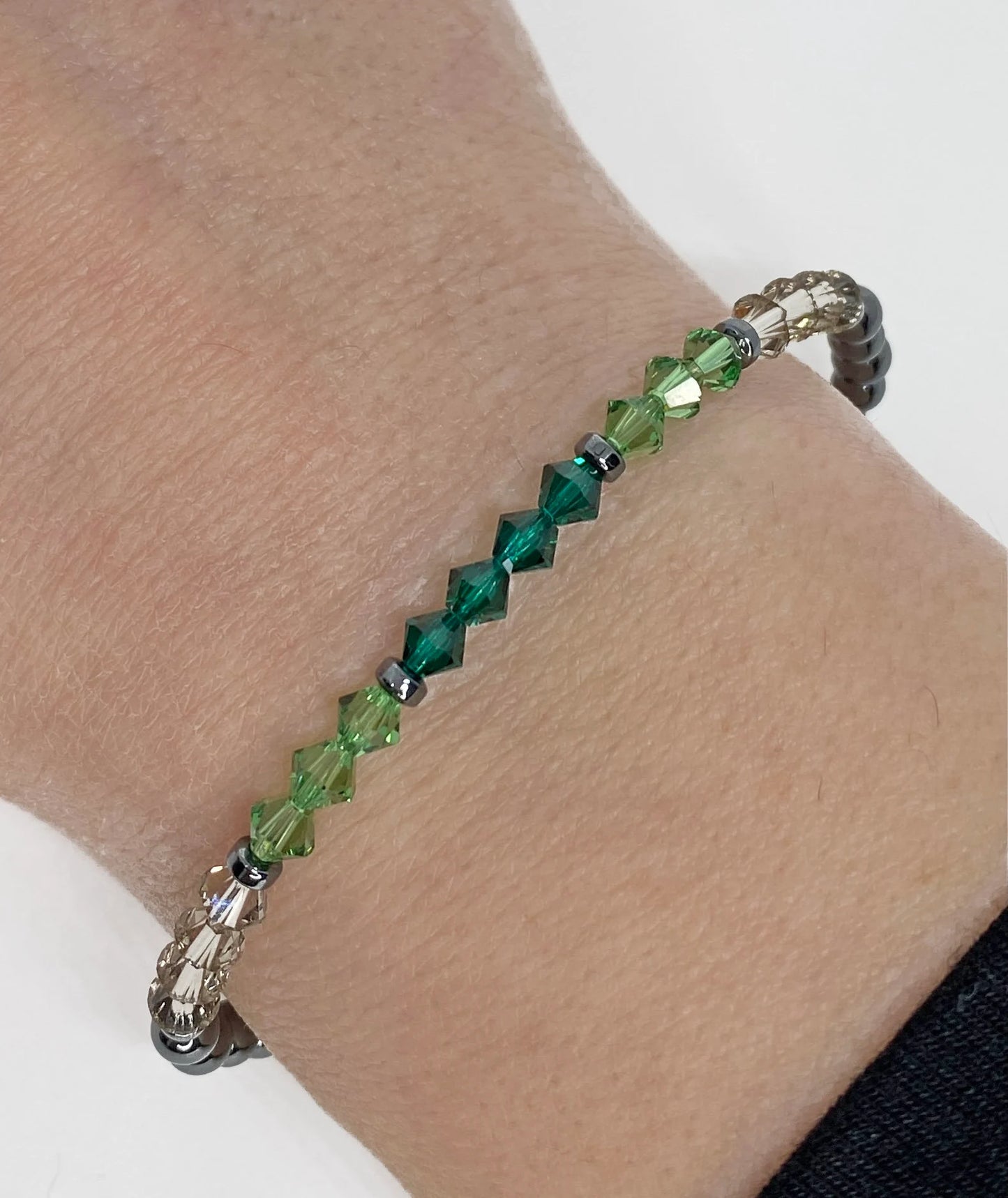 Swarovski Crystal Bicone and Hematite Beaded Stretch Bracelet in Emerald Envy - Emerald, Erinite, and Greige Swarovski Crystals