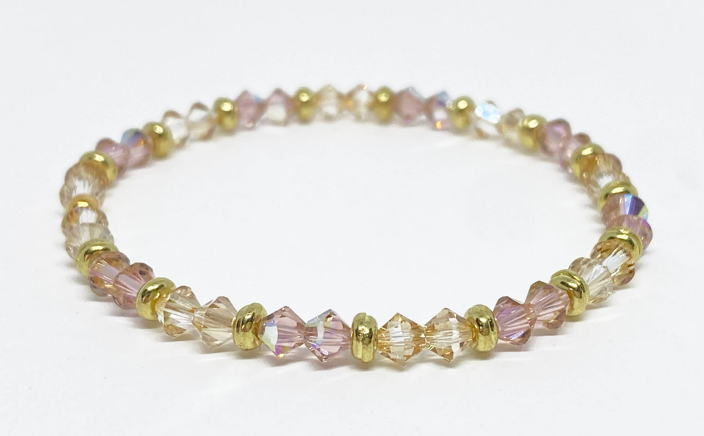 Swarovski Crystal Stretch Accent Bracelet in Vintage Rose AB and Gold