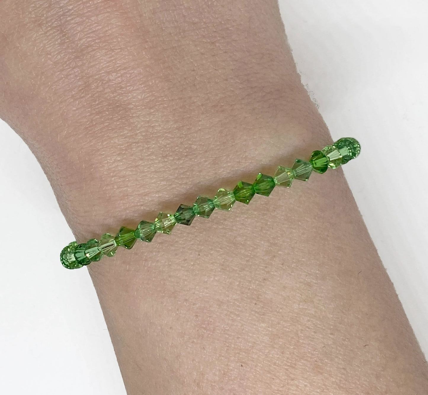 Swarovski Crystal Accent Bracelet in Gardenia - Fern Green, Peridot, and Erinite Swarovski Crystals