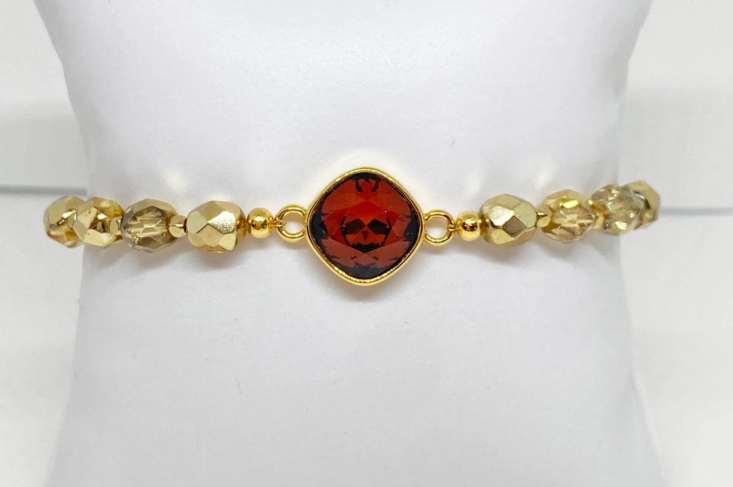 Swarovski Crystal 10mm Cushion Crystal in Smoked Amber with Gold Faceted Beads