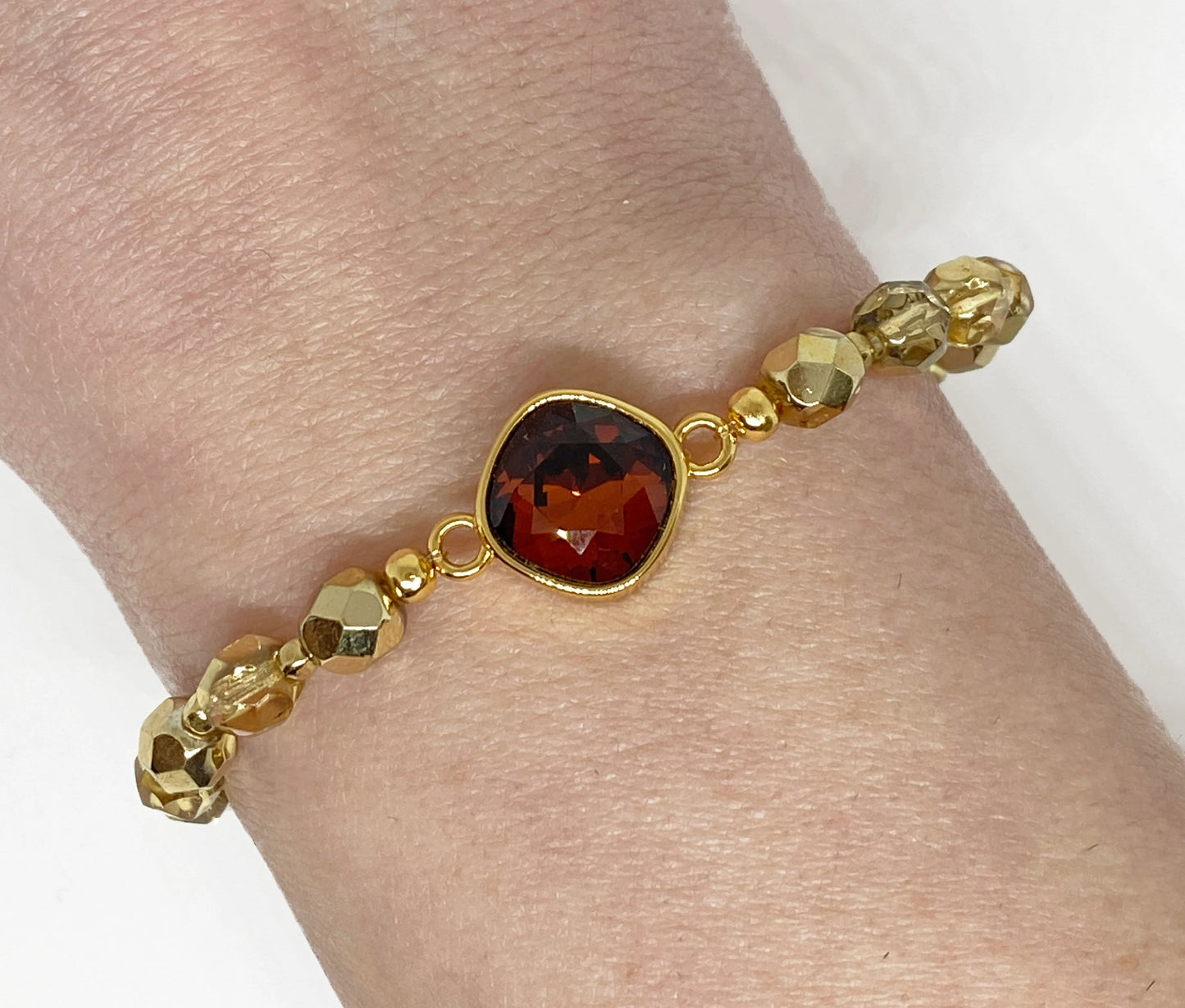 Swarovski Crystal 10mm Cushion Crystal in Smoked Amber with Gold Faceted Beads