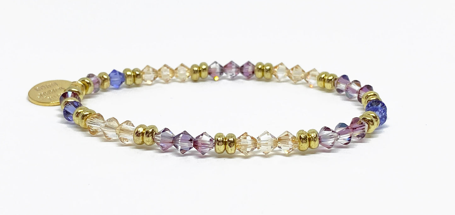 Swarovski Crystal Bicone Stretch Beaded Accent Bracelet in Golden Lilac - with Lilac, Tanzanite, and Golden Shadow Swarovski Crystals