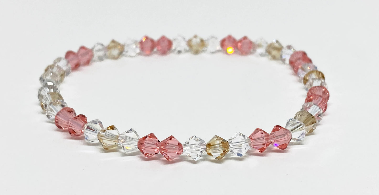 Swarovski Crystal Stretch Accent Bracelet in Rosy Peach with Rose Peach, Golden, and Clear Swarovski Crystals