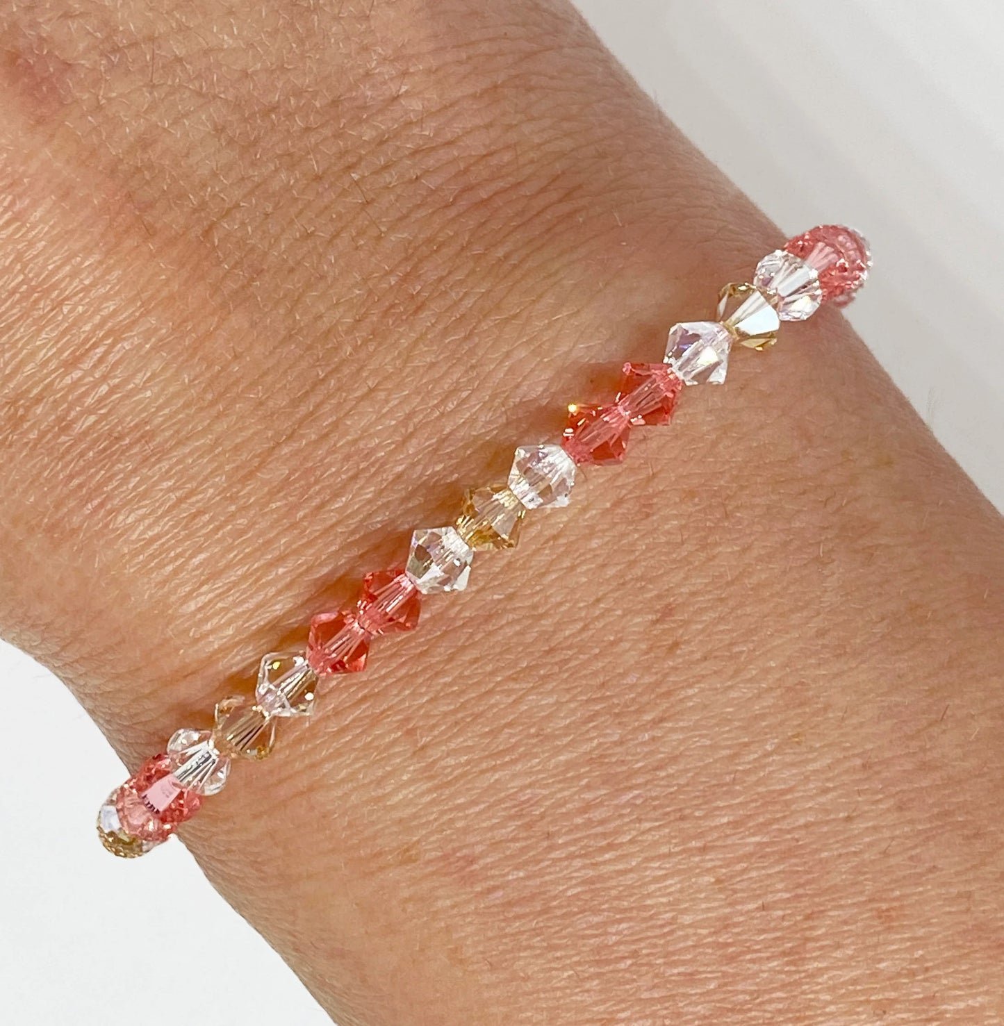 Swarovski Crystal Stretch Accent Bracelet in Rosy Peach with Rose Peach, Golden, and Clear Swarovski Crystals