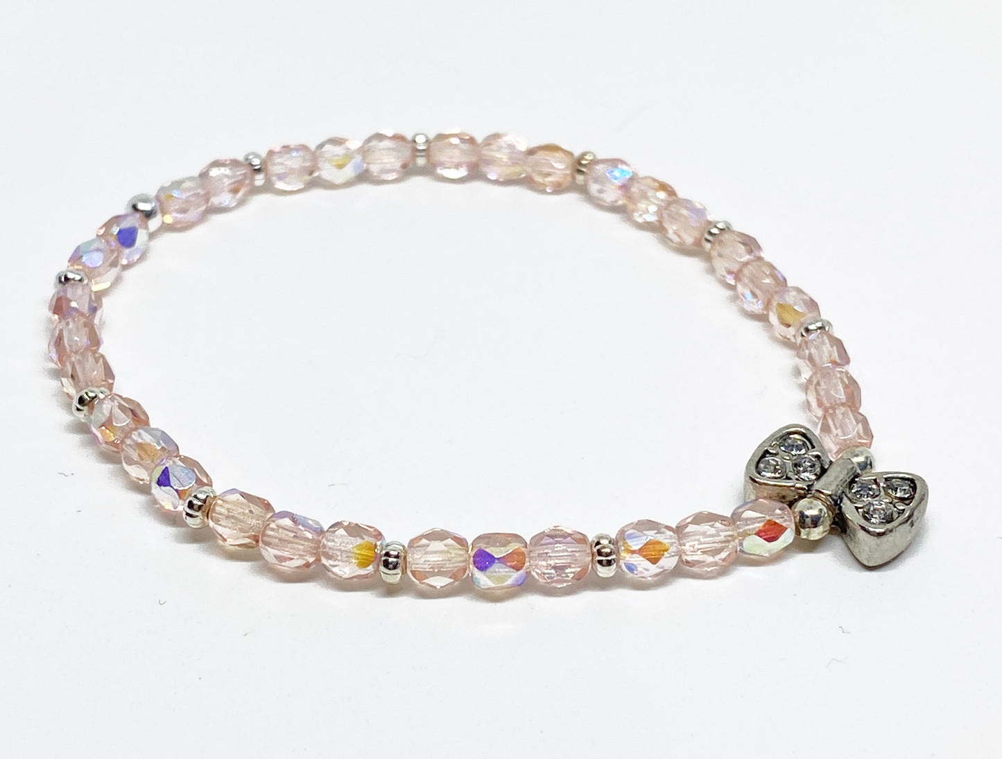 Czech Fire Polished Glass Bead Bracelet in Light Rose AB with Antique Silver Bow Bead