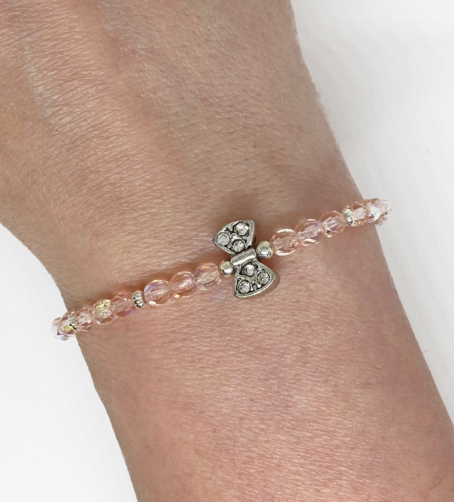 Czech Fire Polished Glass Bead Bracelet in Light Rose AB with Antique Silver Bow Bead