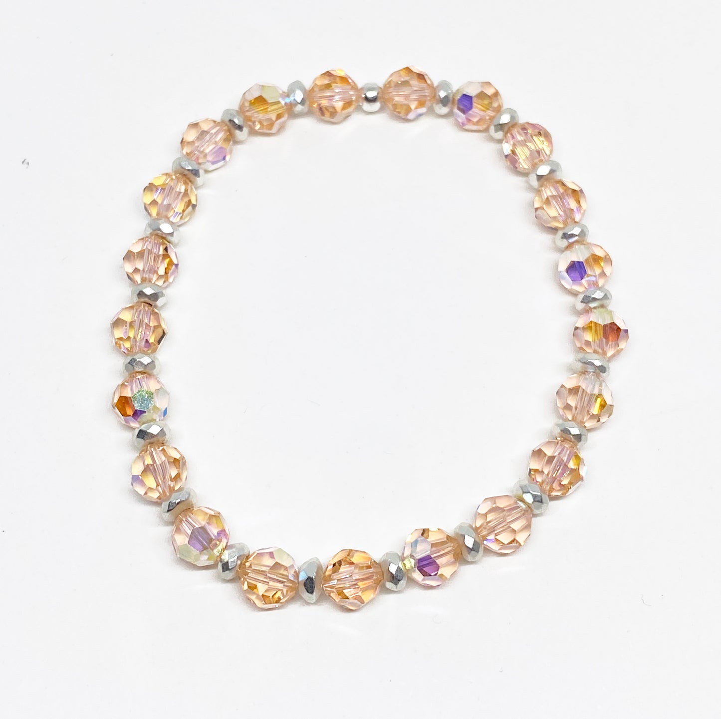 6mm Swarovski Crystal Round Beaded Bracelet in Light Peach Aurora Borealis