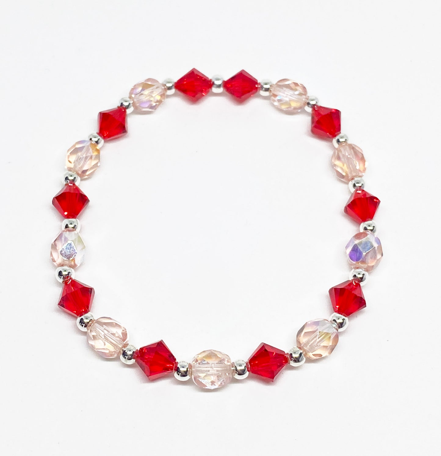 Swarovski Crystal Bracelet in Endless Love, with Light Siam Red Swarovski Crystals. Perfect for Valentine's Day!