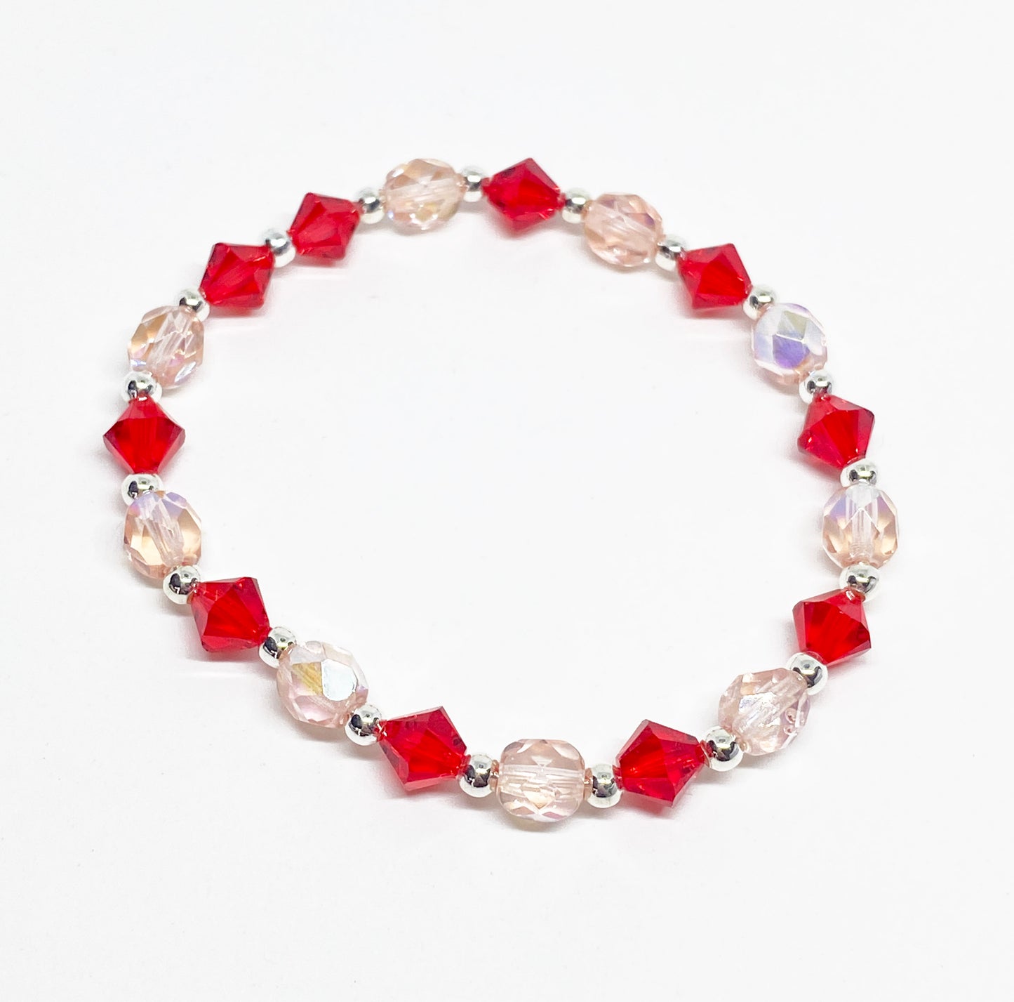 Swarovski Crystal Bracelet in Endless Love, with Light Siam Red Swarovski Crystals. Perfect for Valentine's Day!