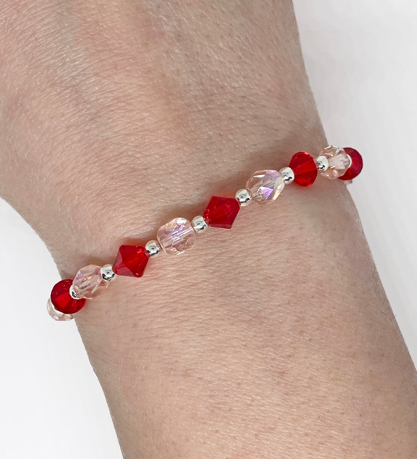 Swarovski Crystal Bracelet in Endless Love, with Light Siam Red Swarovski Crystals. Perfect for Valentine's Day!