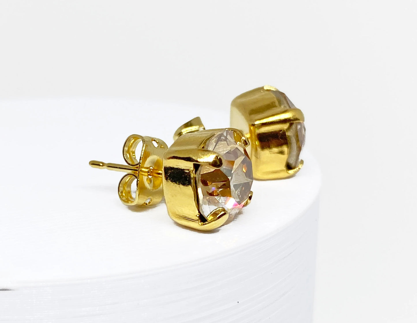 Swarovski Crystal Stud Earrings in Crystal Golden Shadow, set in a gold pronged setting