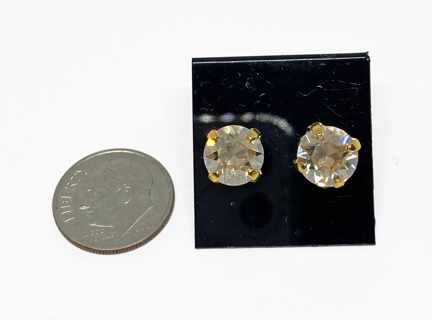 Swarovski Crystal Stud Earrings in Crystal Golden Shadow, set in a gold pronged setting