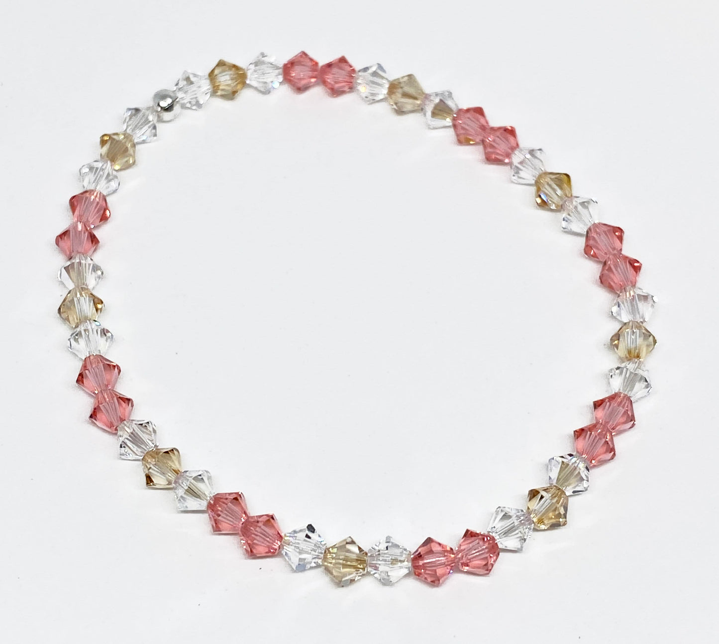 Swarovski Crystal Stretch Accent Bracelet in Rosy Peach with Rose Peach, Golden, and Clear Swarovski Crystals